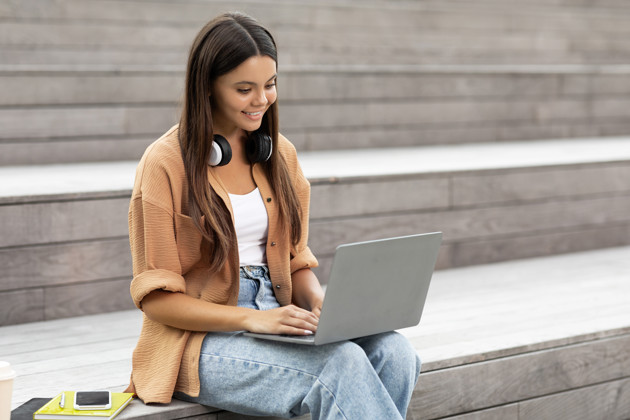 Engaged Student Seamlessly Using Laptop